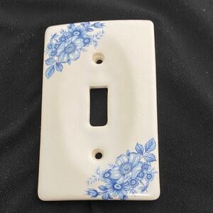 Blue and white flower ceramic switch plate cover.